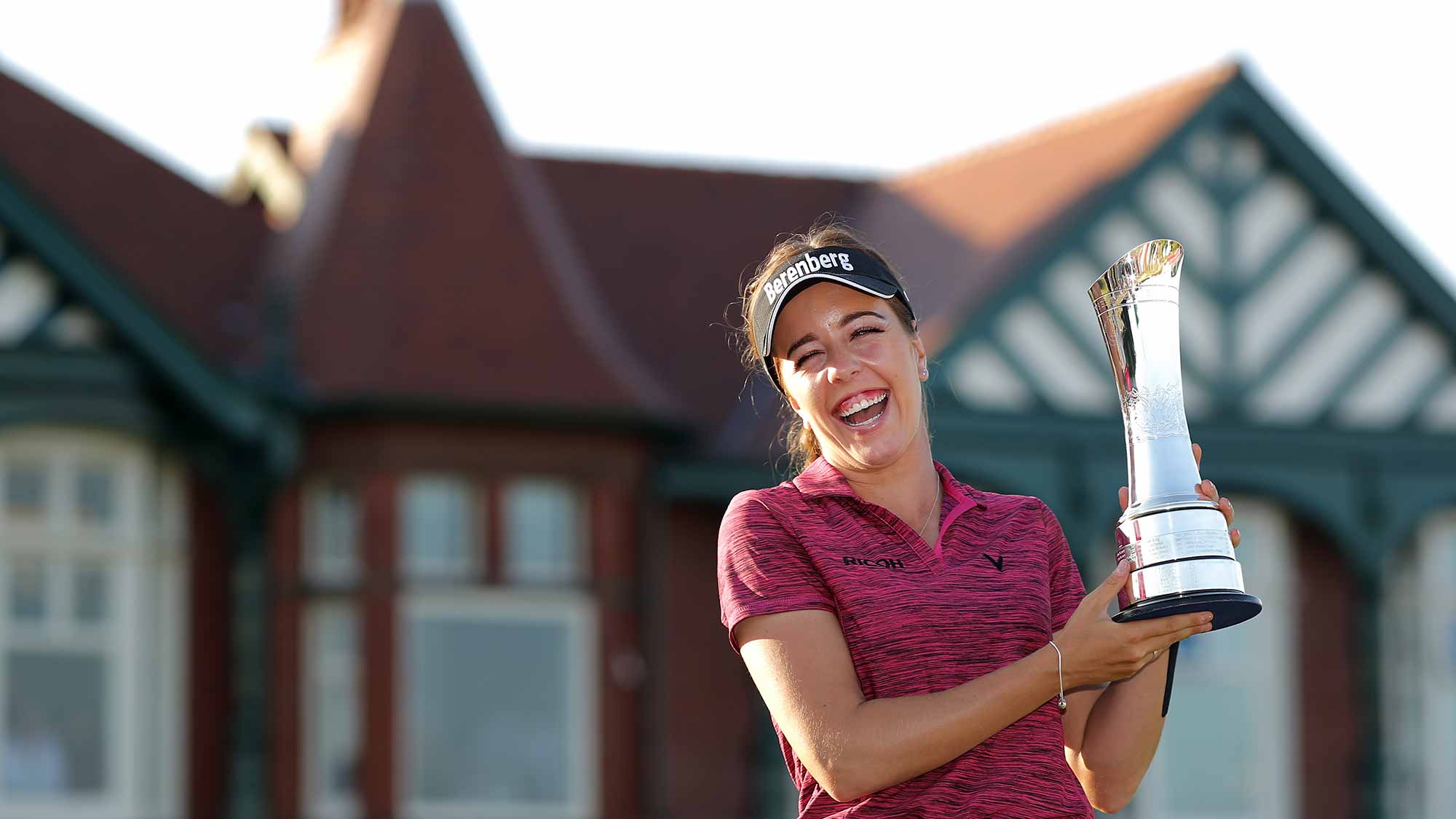 Georgia Hall of England poses for a photo with her trophy after winning the tournament during day four of Ricoh Women's British Open at Royal Lytham & St. Annes on August 5, 2018 in Lytham St Annes, England