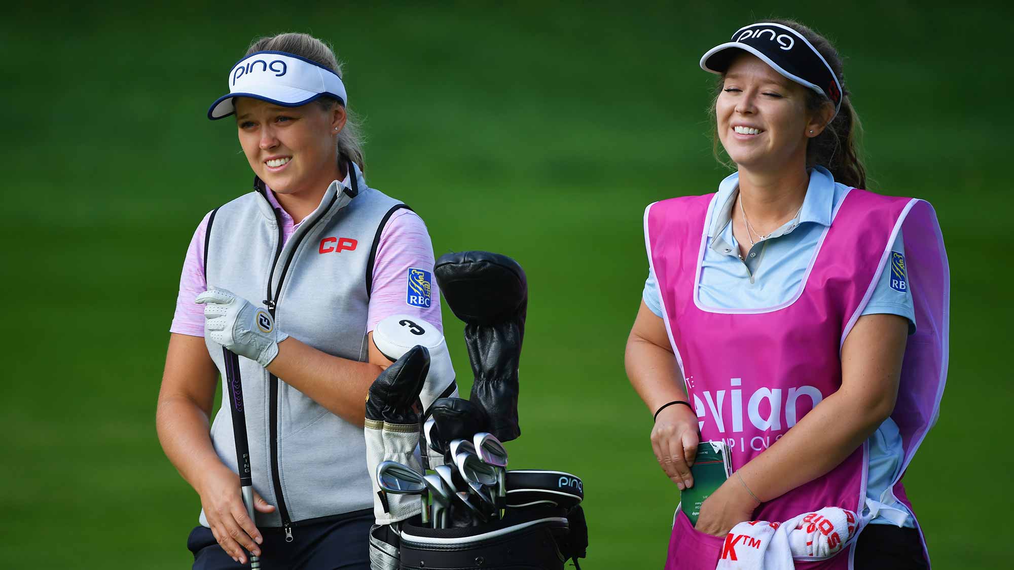 Brooke Henderson of Canada and caddie look on during day one of the Evian Championship at Evian Resort Golf Club on September 13, 2018 in Evian-les-Bains, France