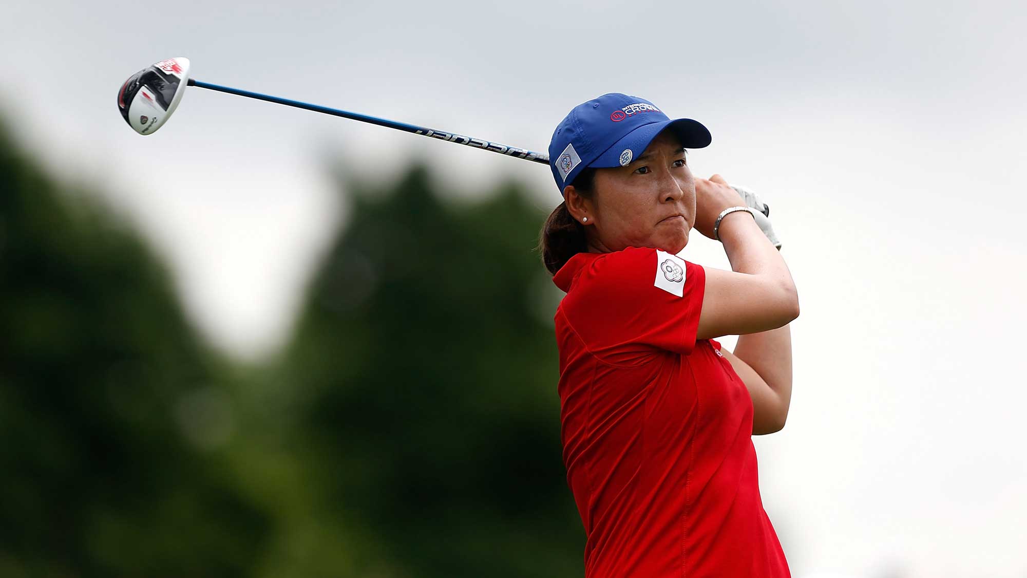 Candie Kung of Chinese Taipei hits her tee shot on the fourth hole during the four-ball session of the 2016 UL International Crown
