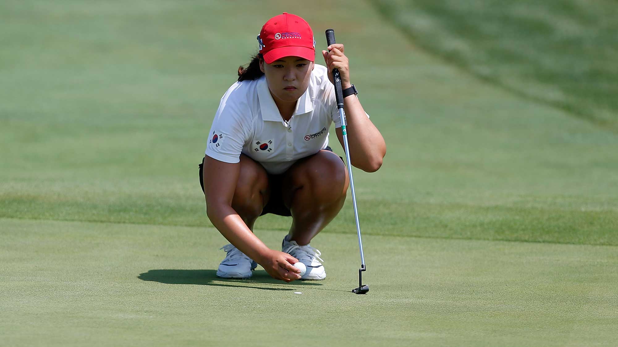 In Gee Chun of Korea lines up a putt on the first hole during the singles matches of the 2016 UL International Crown