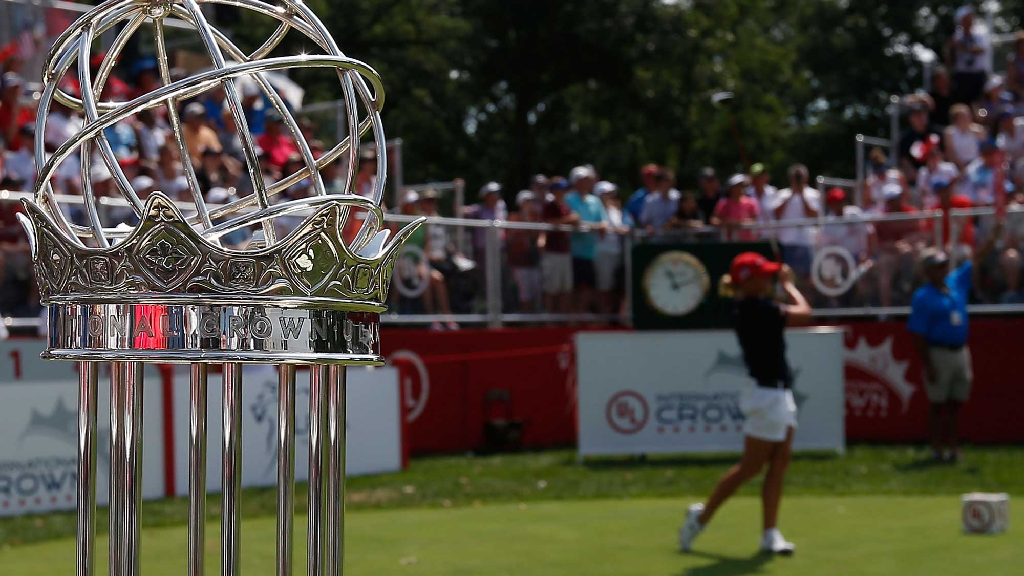 A detailed view of the championship trophy as Stacy Lewis of the United States hits her tee shot on the first hole during the singles matches of the 2016 UL International Crown