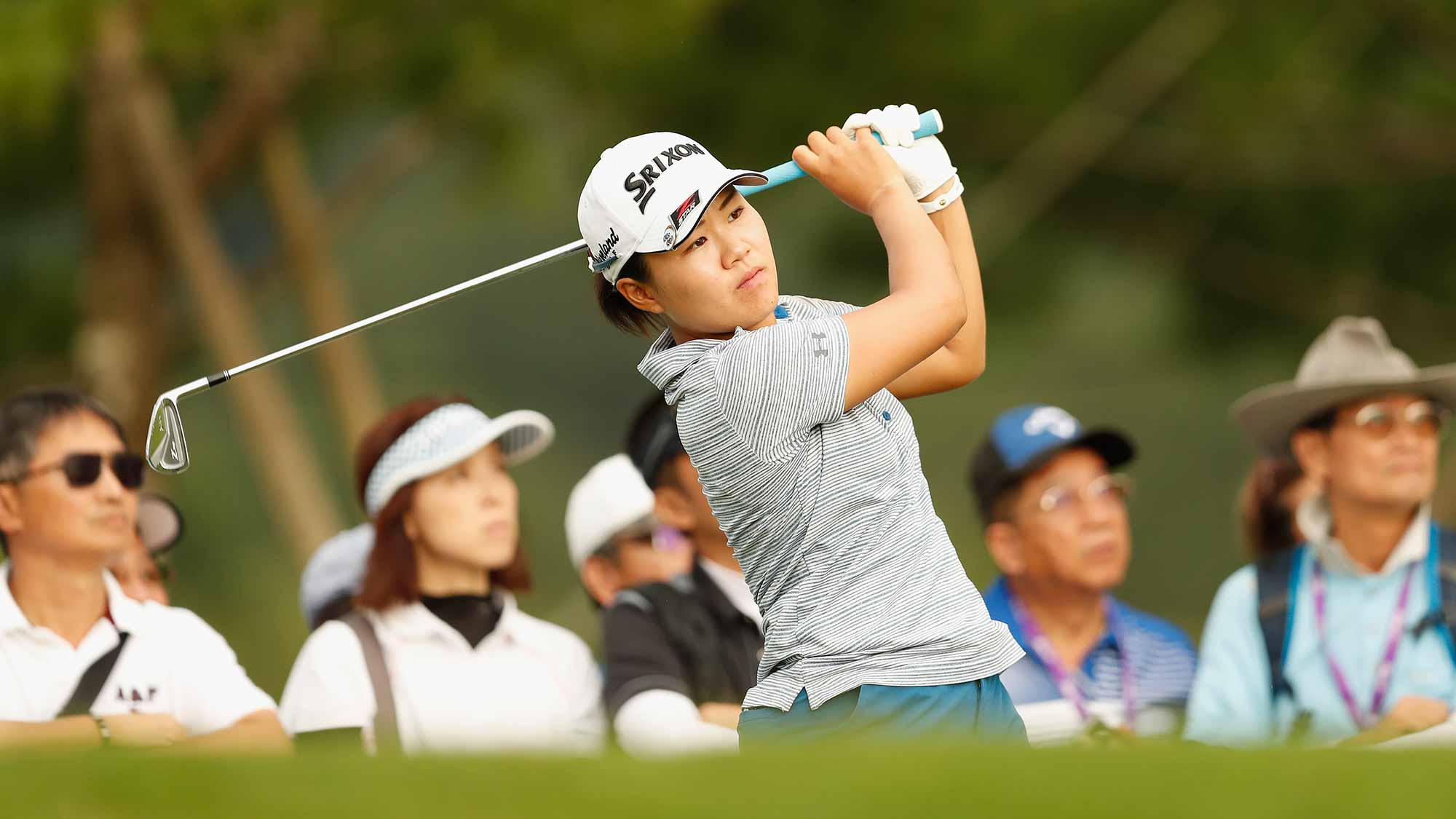 Nasa Hataoka of Japan plays a shot at the eighteen hole during the first round of the Swinging Skirts LPGA Taiwan Championship at Ta Shee Golf & Country Club on October 25, 2018 in Taoyuan, Chinese Taipei