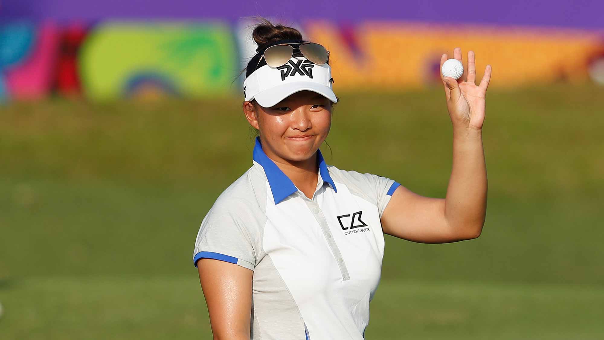 Megan Khang of United States acknowledges to the spectators at the eighteen hole during the second round of the Swinging Skirts LPGA Taiwan Championship at Ta Shee Golf & Country Club on October 26, 2018 in Taoyuan, Chinese Taipei