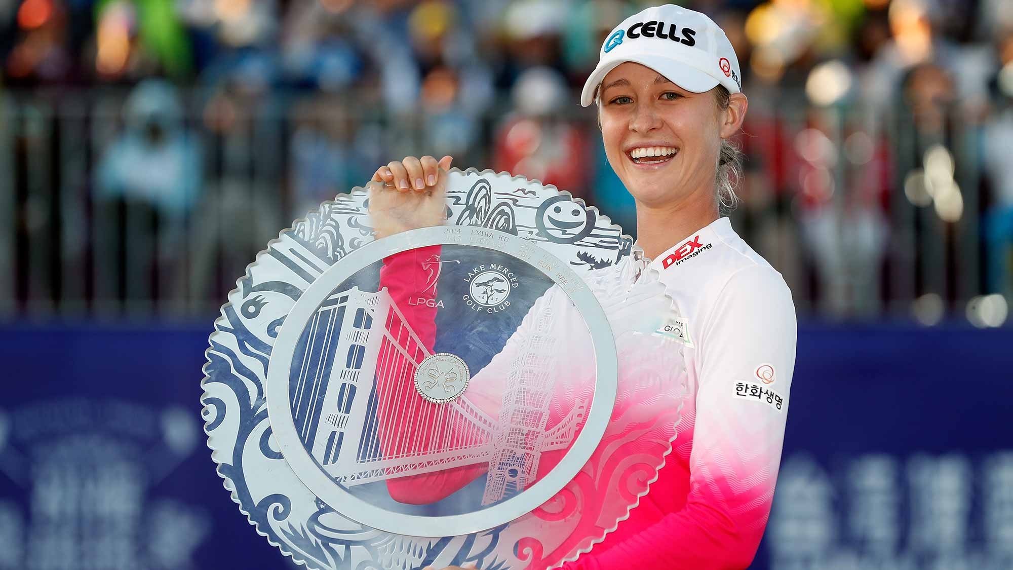 Nelly Korda poses with her trophy on the 18th green after winning the Swinging Skirts LPGA Taiwan Championship at Ta Shee Golf & Country Club on October 28, 2018 in Taoyuan, Chinese Taipei